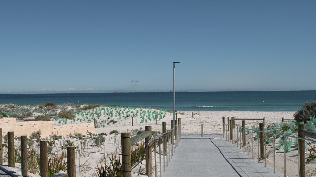 Boardwalk to the beach during daytime
